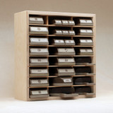 Storage shelf for lock down punches